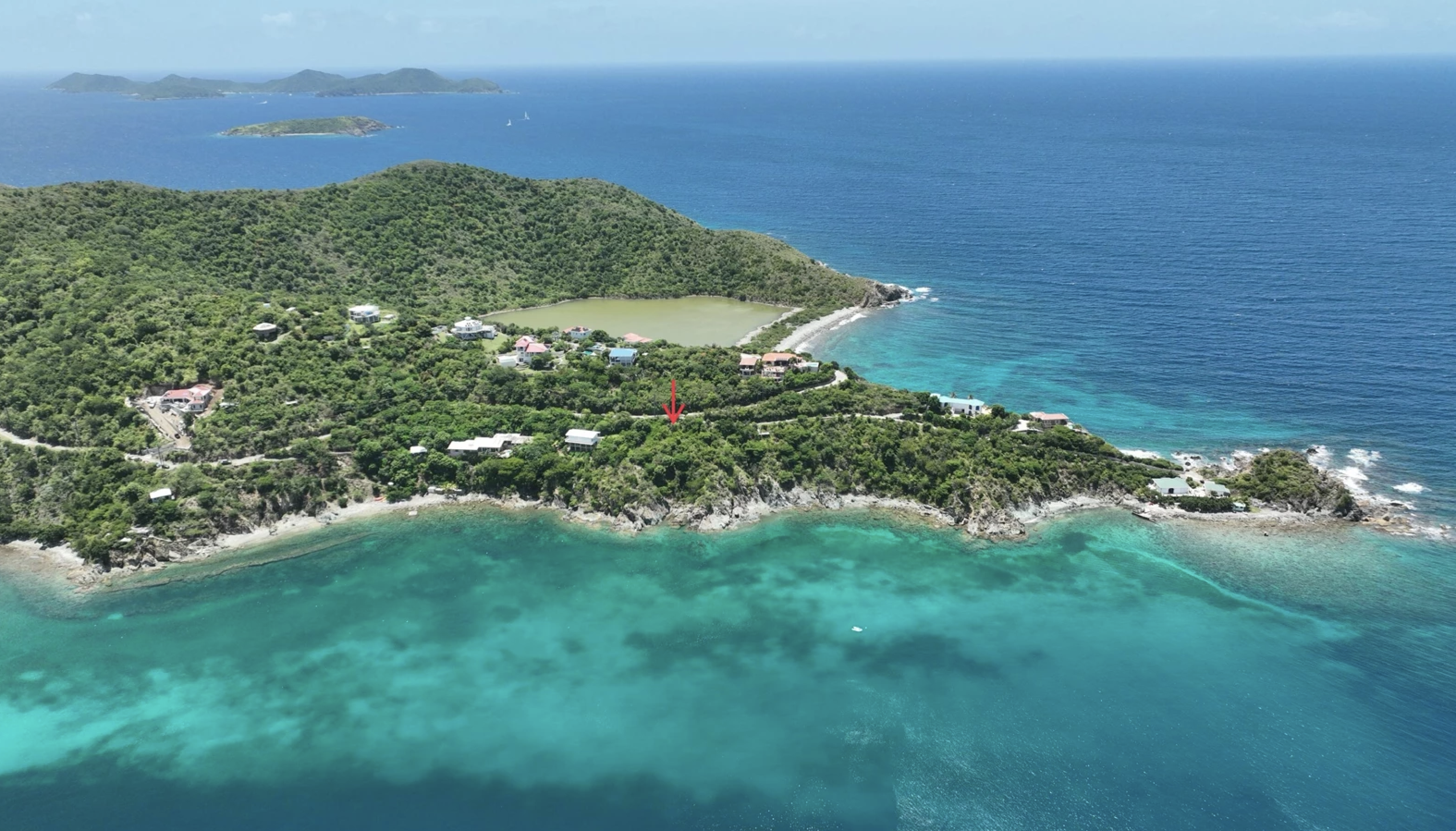 Discover the opportunity to create your dream retreat on this stunning half-acre waterfront parcel in Hansen Bay.